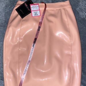 House of CB pinkish nude patent skirt